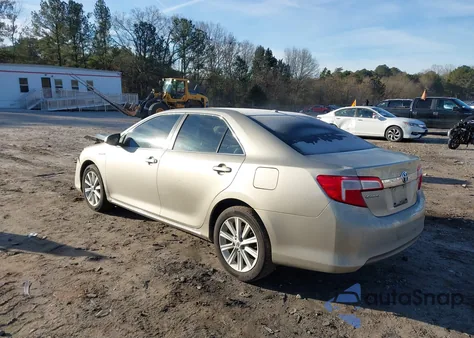 2014 Toyota Camry Hybrid Xle z USA, uszkodzony, nr VIN 4T1BD1FK6EU097647